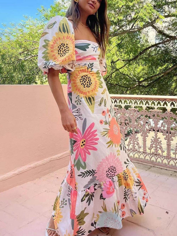 Elegantes Maxikleid mit Blumendruck und Puffärmeln