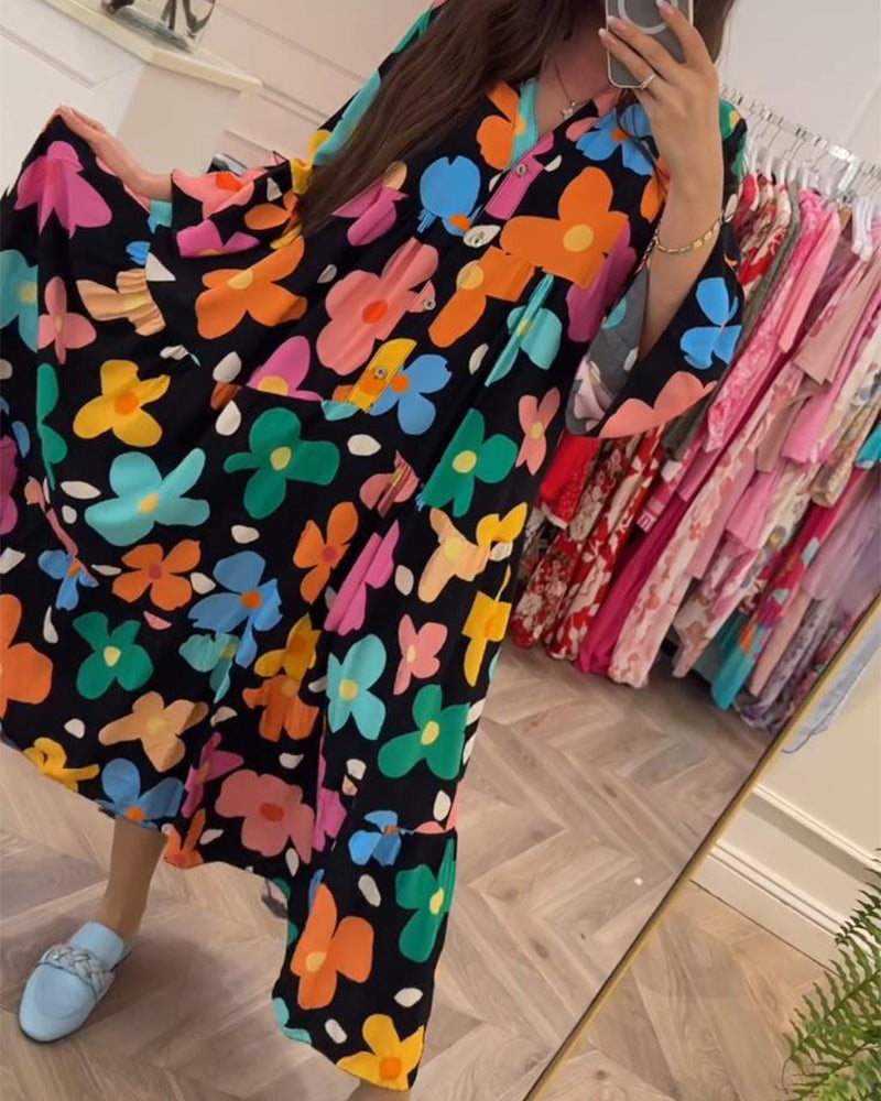 Elegantes Noa Kleid mit Blumen und Trompetenärmeln
