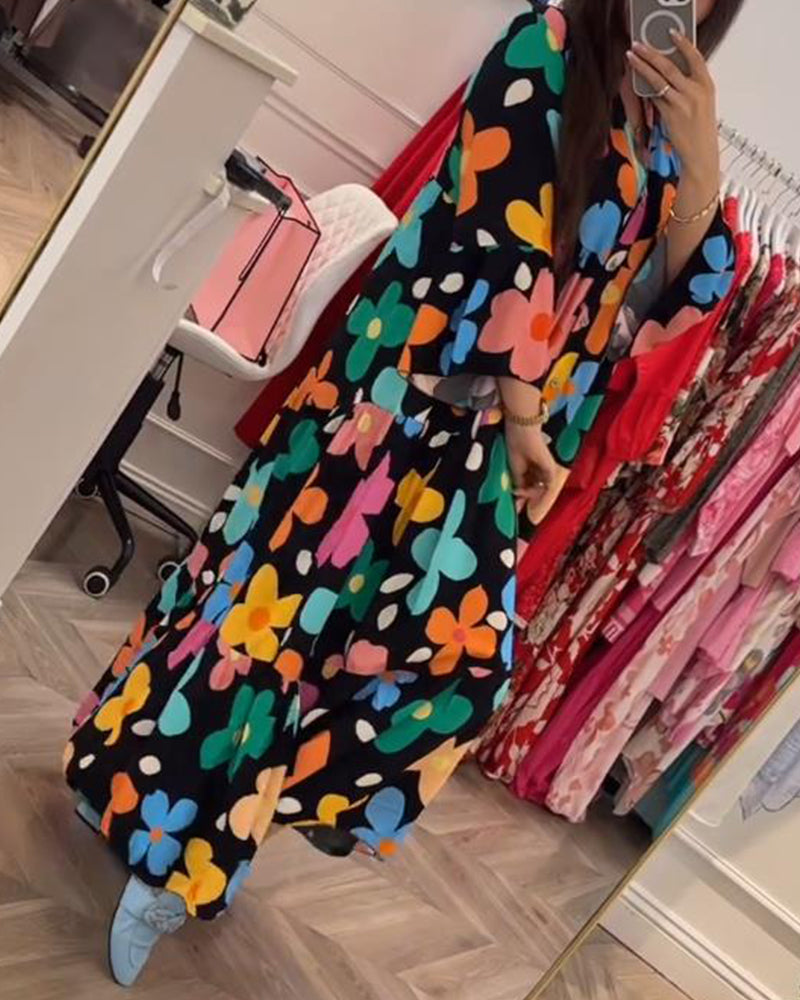 Elegantes Noa Kleid mit Blumen und Trompetenärmeln