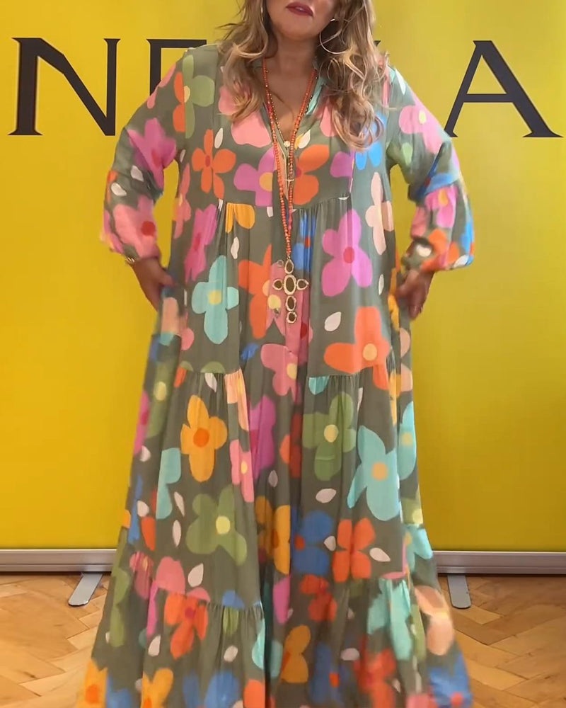 Elegantes Noa Kleid mit Blumen und Trompetenärmeln