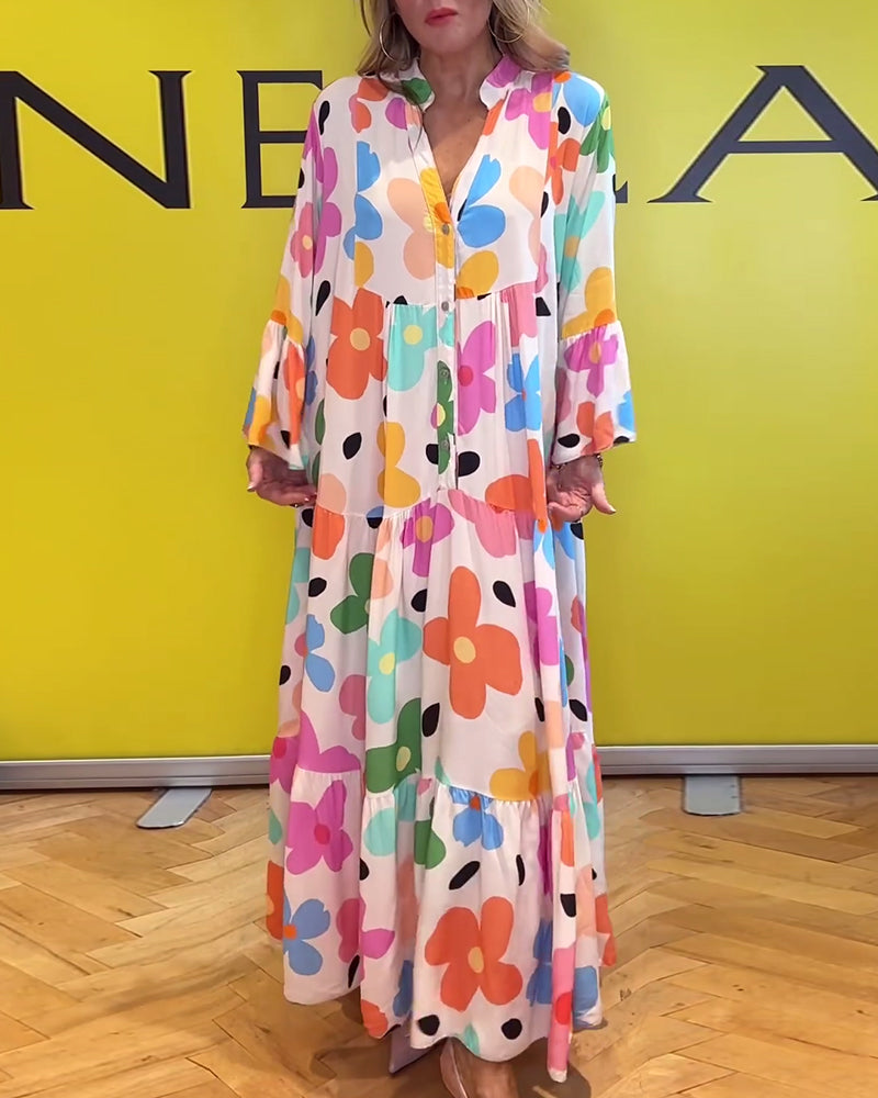 Elegantes Noa Kleid mit Blumen und Trompetenärmeln