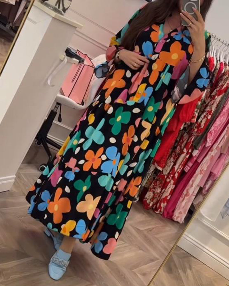 Elegantes Noa Kleid mit Blumen und Trompetenärmeln
