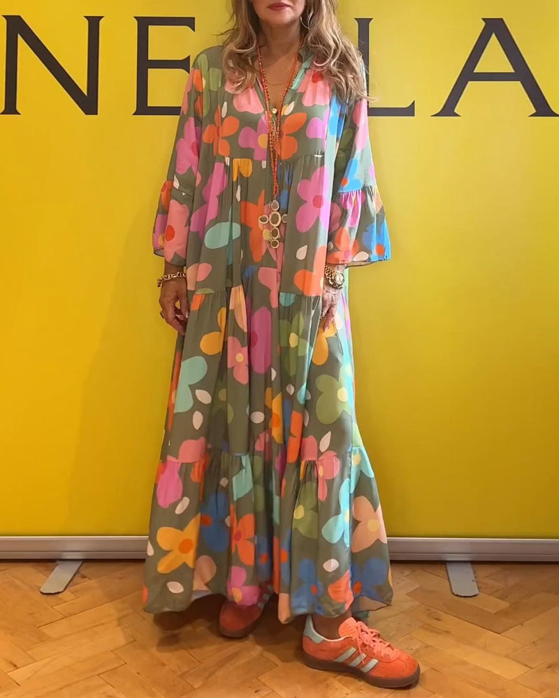 Elegantes Noa Kleid mit Blumen und Trompetenärmeln