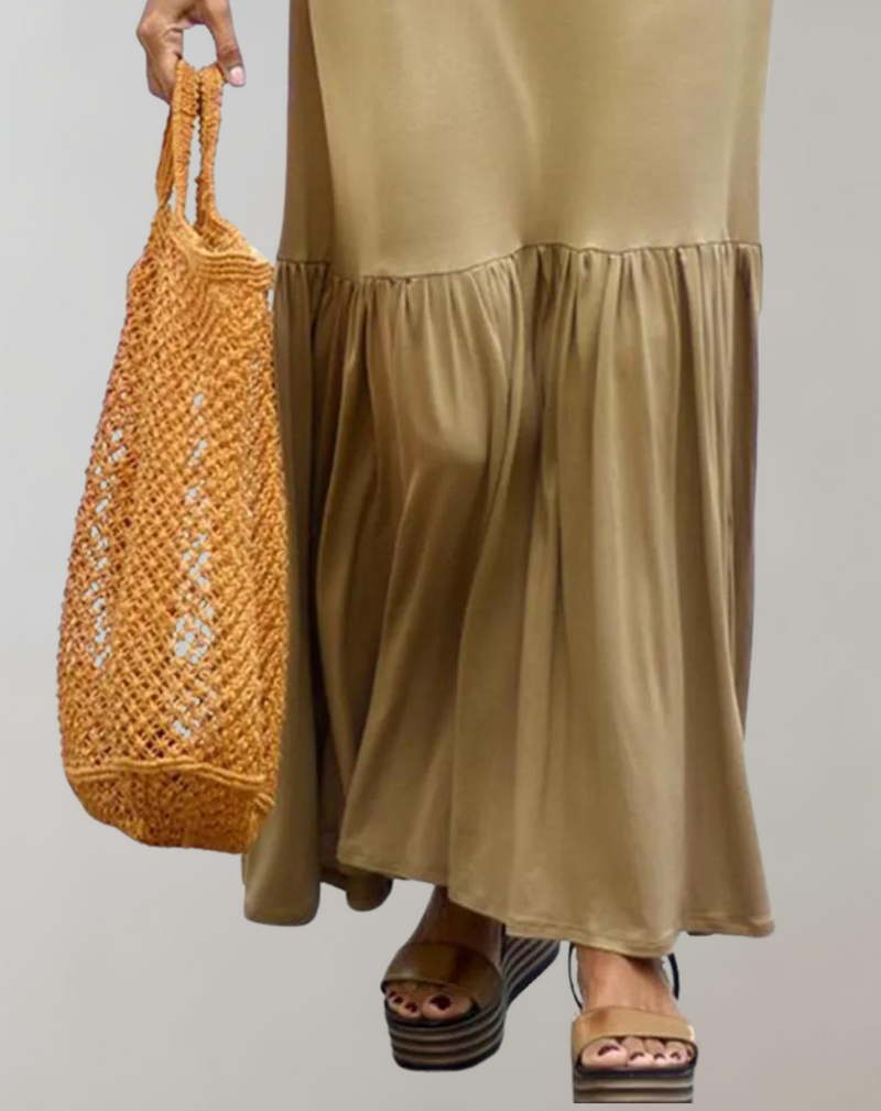 Elegantes Sommerkleid mit breitem Saum und Strapsen