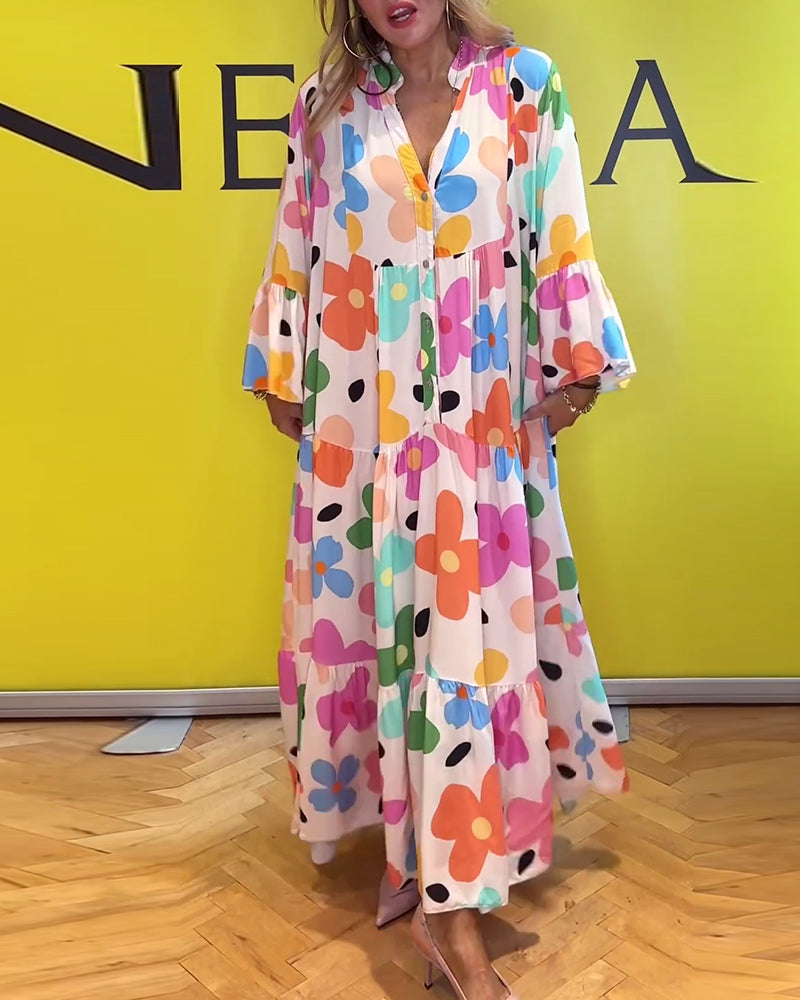 Elegantes Noa Kleid mit Blumen und Trompetenärmeln