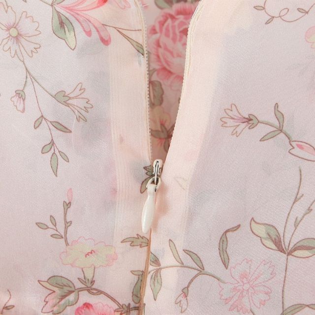 Elegantes Heidi -Blumenkleid mit Puffärmeln