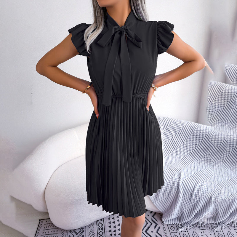 Elegante und bequeme geplooide Sommerkleid für jeden Anlass