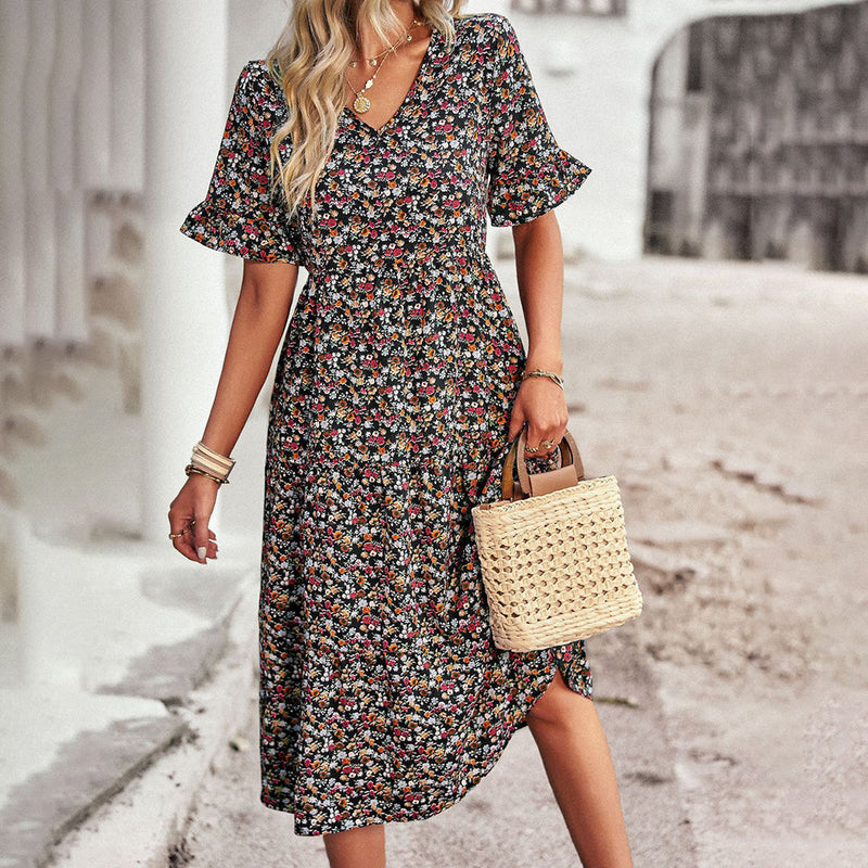 Buntes, elegantes Midi-Kleid für den perfekten Sommerlook
