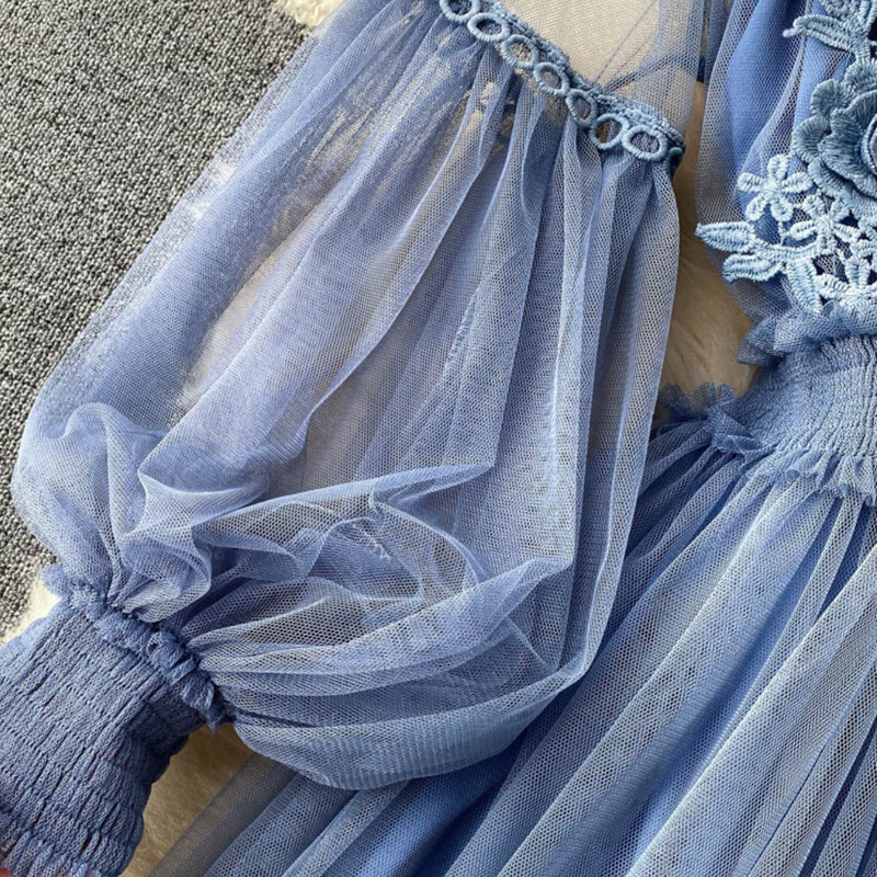 Elegante Blumenbluse mit Stehkragen und Lanternärmeln