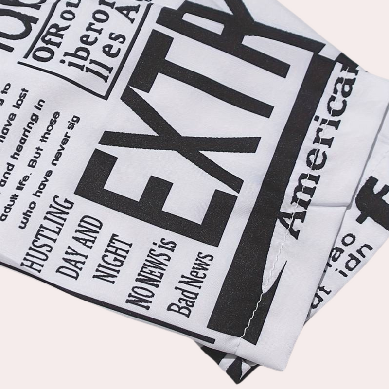 Elegante Kleid mit Künstlerischer Zeitungsdruck-Optik