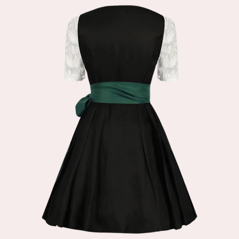 Elegantes Dirndl mit Spitzenärmeln für festliche Anlässe