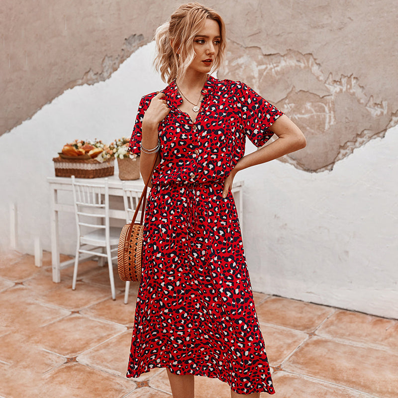 Elegante V-Hals Kleid mit stilvollem Druck