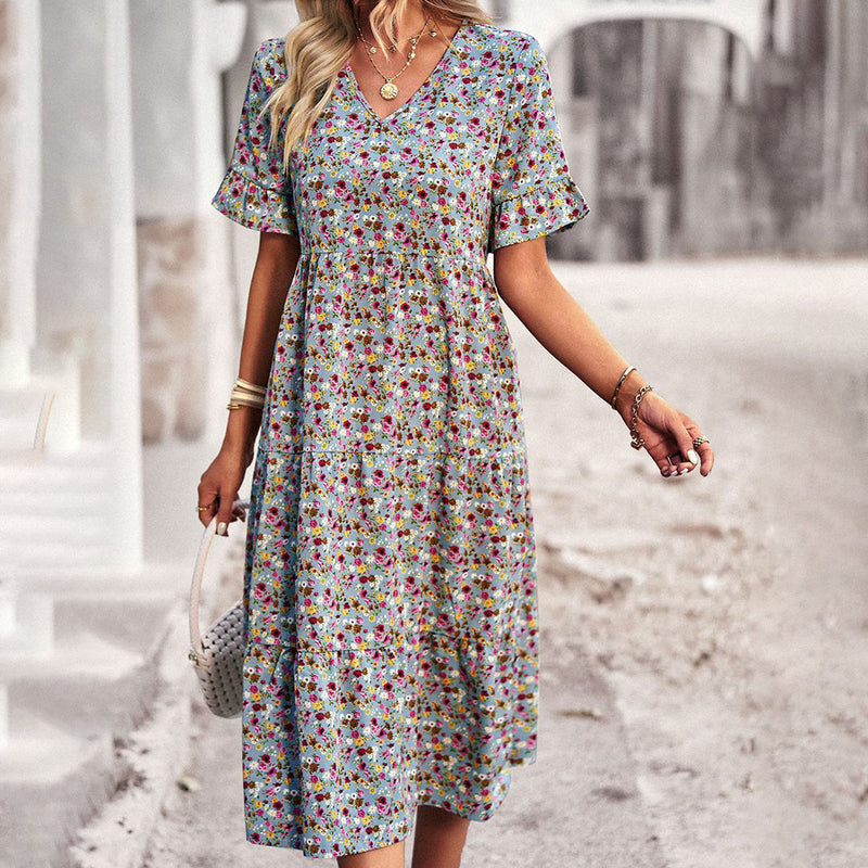 Buntes, elegantes Midi-Kleid für den perfekten Sommerlook