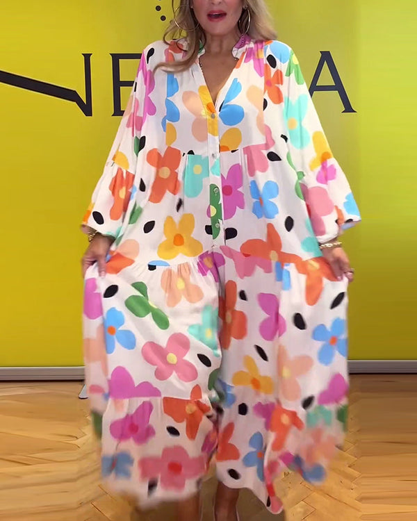 Elegantes Noa Kleid mit Blumen und Trompetenärmeln