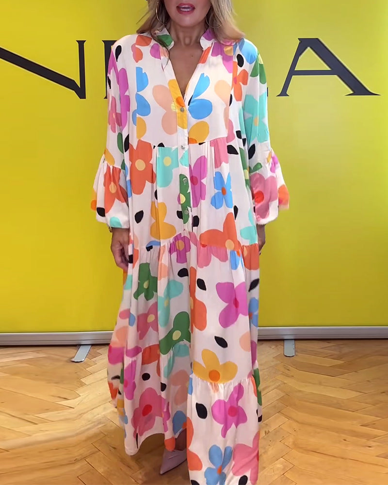 Elegantes Noa Kleid mit Blumen und Trompetenärmeln