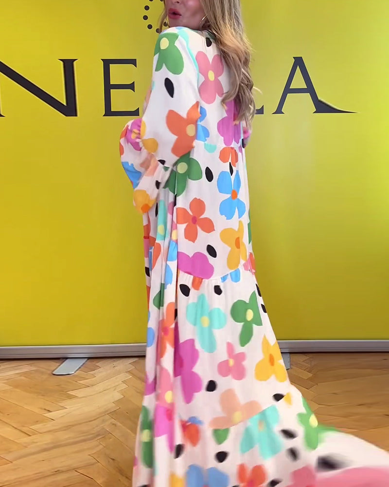 Elegantes Noa Kleid mit Blumen und Trompetenärmeln