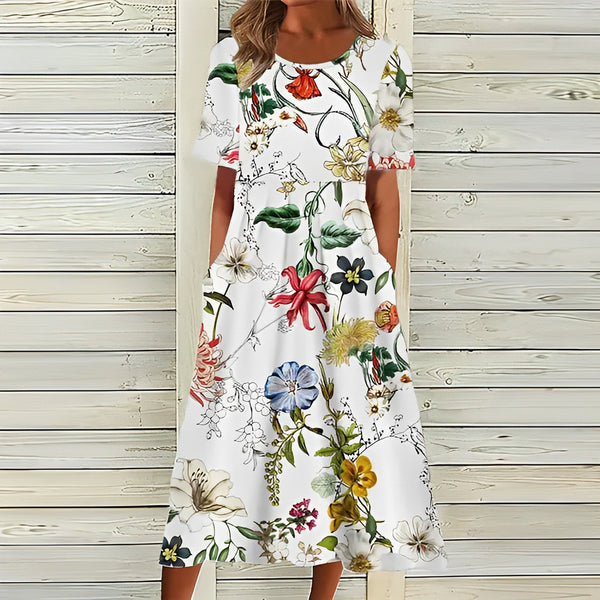 Stilvolles weißes Kleid mit Blumenmuster
